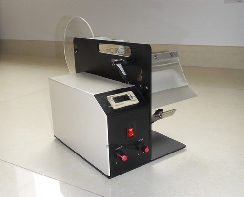 Auto label dispensers - label,