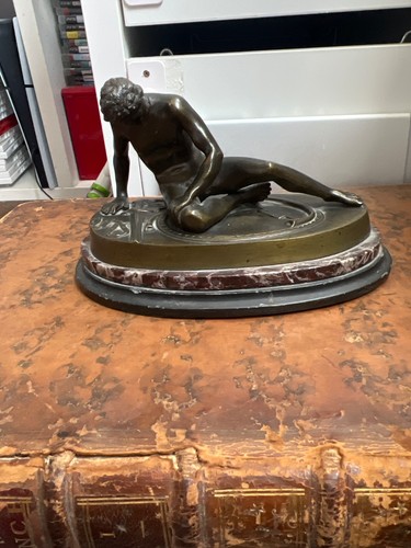 Antique bronze model dying - model,
