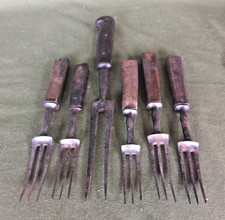 Vintage Dinning Forks and a carving fork wood handles  steel.