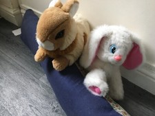 2 soft toy rabbits one by animagic