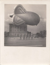 Photograph 14.7x18.7 cm Barrage Balloon outside a Military Base / Men in Uniform