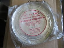 ALLOY 12 INCH  WHEEL TRIMS  CHECK SIZES POSS VIVA OR IMP  N.O.S