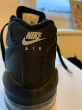 kids black nike air trainers