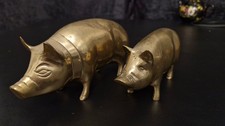 Brass pigs x 2 used one small one bigger
