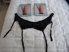 Ladies suspender belt size 10 and two packs of stockings