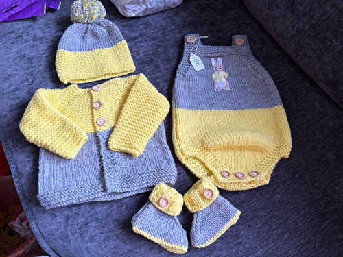 New hand knitted newborn - hand,