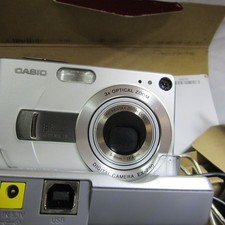 CASIO EXILIM EX-Z30 DIGITAL CAMERA MAINS CHARGER AND CARD tested and working 