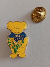 Marie Curie Teddy Holding