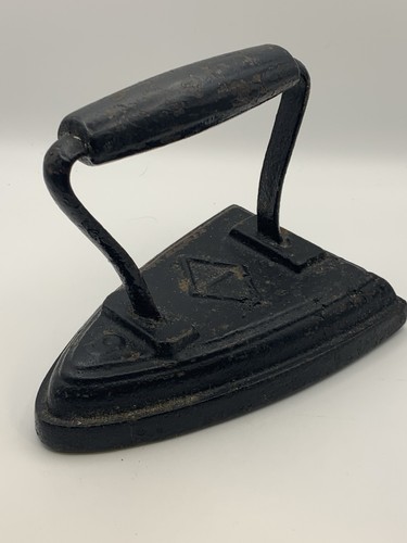 Antique cast iron sad - antique,