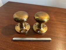 Pair Of Brass Door Knobs •