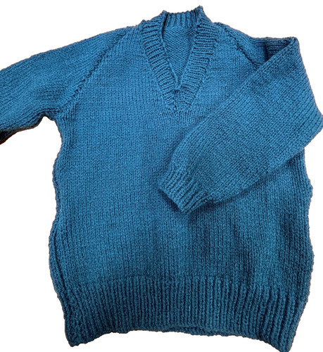 Hand knitted teal - hand,