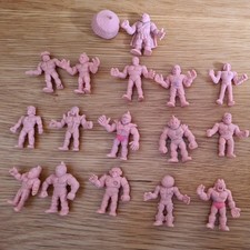 16  x M.U.S.C.L.E. FLESH Muscle men figures Vintage 1980's + Spinning Top