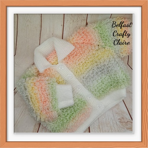 Hand knitted baby loopy - hand,