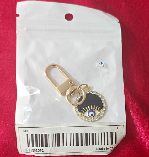 Gold tone evil eye circle - tone,