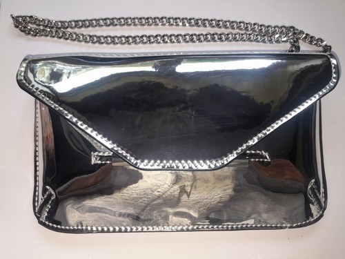 Silver shoulder bag marks and - bag.,