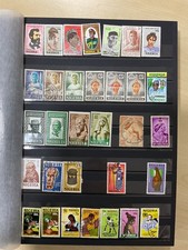 Kenya, Uganda, Nigeria etc stamps, Mint/used in large stock book. D/48