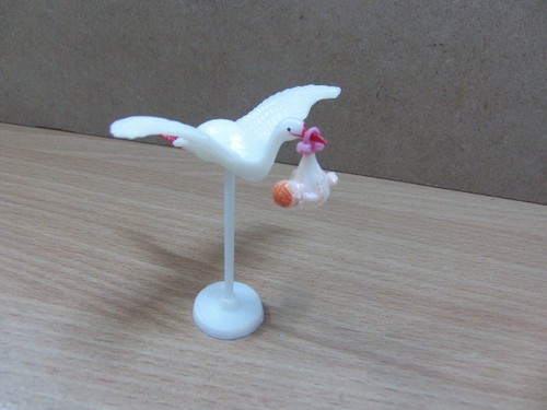 Stork carrying baby - stork,
