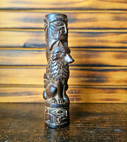 Wooden hand carved wolf - hand,