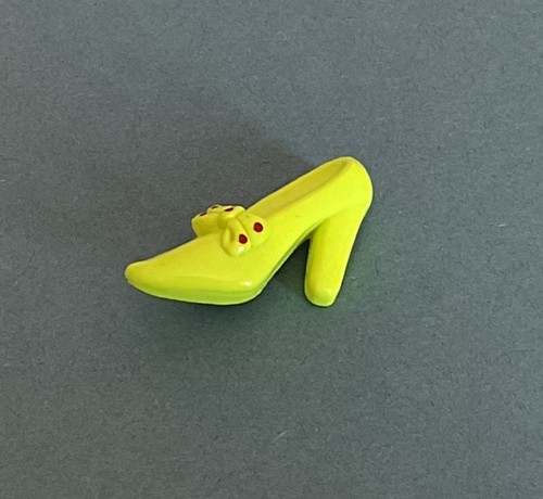 Neon yellow shoe - shoe, badge
