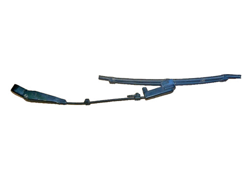 Wiper arm headlight cleaning