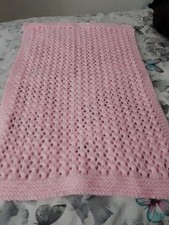hand knitted pram blanket in pink