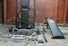 York weight bench and bar bells, Pro Power sit-up bench plus other accessories.
