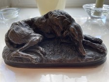 A 19th Century French Bronze Model of a Reclining Deerhound..  Heavy. Good Cond