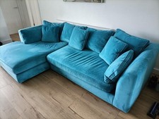 Three seater sofa including a full length seat.