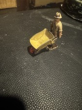 Gardener With Wheelbarrow By