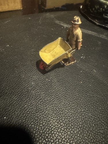 Gardener with wheelbarrow - gardener,