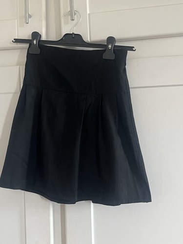 Two black pleated girl - pleated, girl’s