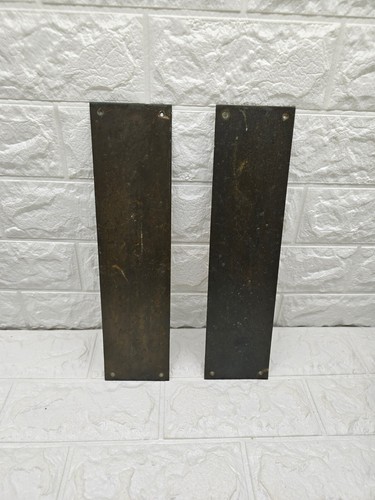 Pair antique brass - of, bronze