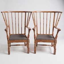 Antique windsor chair with arms and short legs