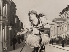 Vintage Woman on Bicycle