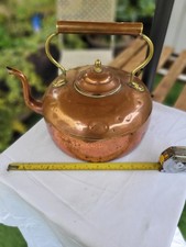 large antique copper kettle