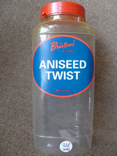 Tall vintage plastic sweet jar