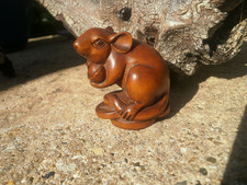 Hand Carved wood netsuke of a