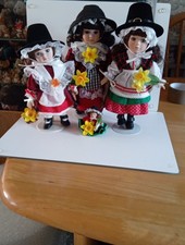 Set Of Porcelain Dolls In