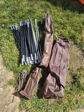 Spare Poles And Ground Pegs