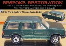 DARK GREEN FORD EXPLORER