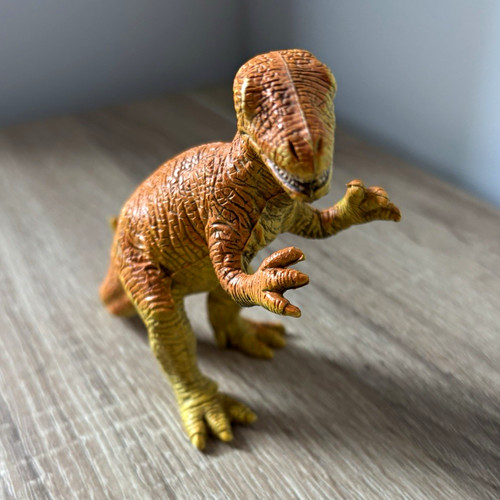 Brown yellow rex dinosaur - &,