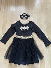 Batgirl costume inspired by the DC Comics superhero. Includes Eye Mask