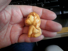 Carved wood , netsuke size 