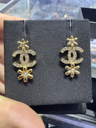 Chanel gold toned crystal - toned,