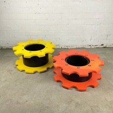 Two Reclaimed Industrial Plastic Machine Cogs