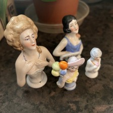 Four Vintage Porcelain Pin