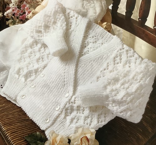 Hand knitted baby - hand,