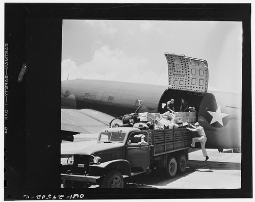 Unloading cargo from united - from,