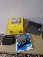 TomTom ONE XL portable GPS navigation system.