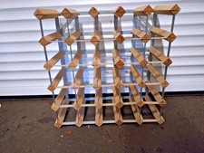 Cranville wine rack storage 30 bottle pine wood and metal wine rack, assembled